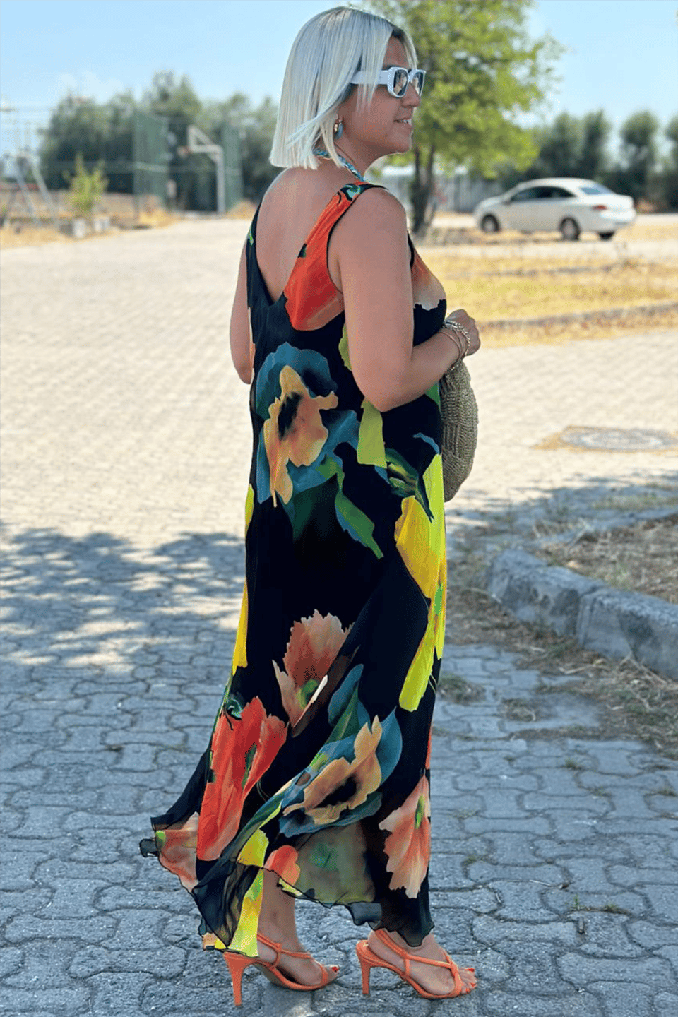Maxi dress made of silk chiffon with a floral pattern and a U-shaped neckline